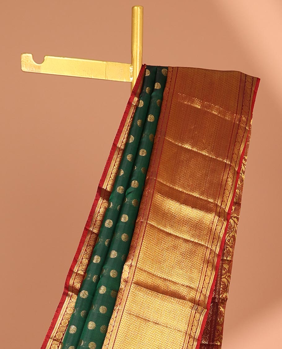 Green zari buttas Kanchipuram silk saree, contrast zari border of kuthirai design & pallu of rekku,poun,mayil & zari design