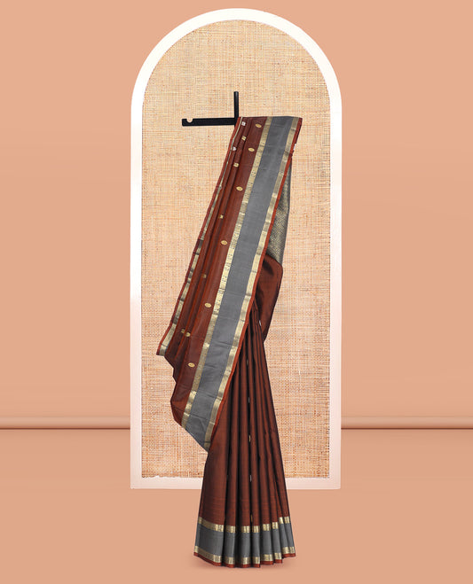 Brown Kanchipuram Silk Saree, Artfully Detailed with Mayil-Chakram Buttas, a Contrast Rettai Pettu Border of Mayil and Chakram Designs, Jaal Pallu, and a Contrast Blouse