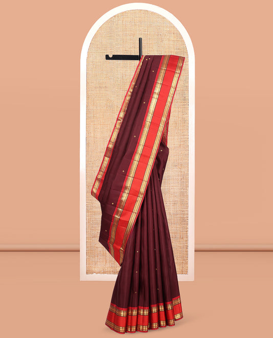 Maroon Kanchipuram Silk Saree, Elevated with Zari Buttas, Complemented by Contrast Border of Rekku, Muthu, Poun, Vanki, and Mayil Kann, Zari Design Pallu, and Contrast Blouse