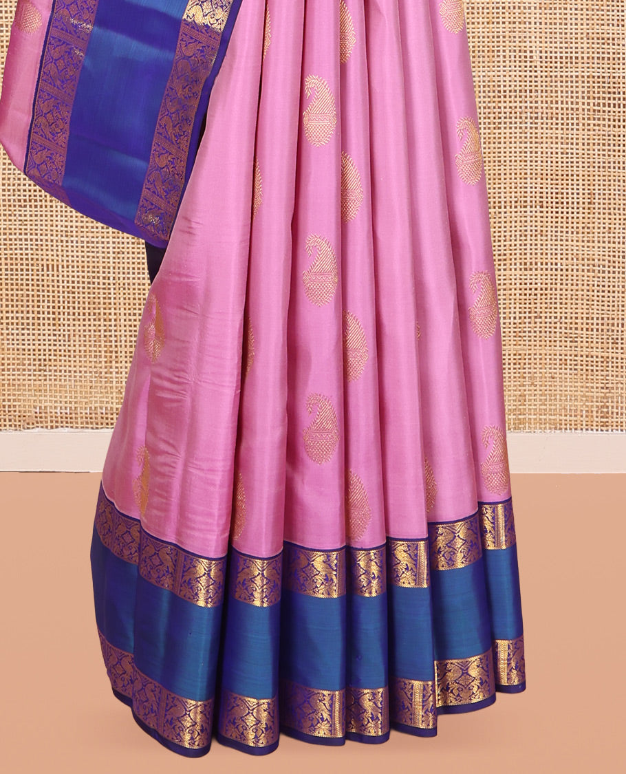Pink Kanchipuram Silk Saree, Bedecked with Zari Buttas, a Contrast Korvai Rettai Pettu Border of Kili Designs, Butta Enclosed Checked Pallu, and a Contrast Blouse
