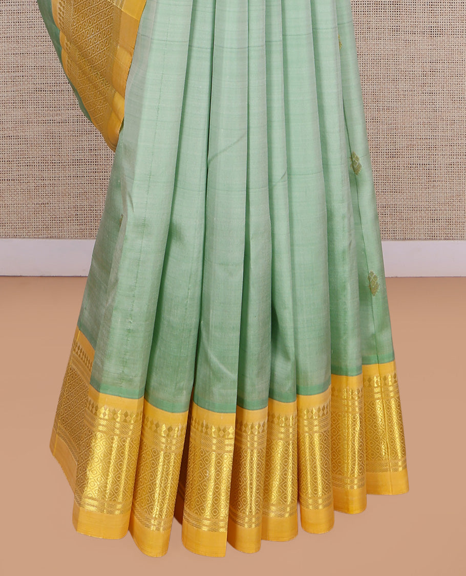 Green Kanchipuram Silk Saree, Woven with Zari Buttas, a Contrast One-Sided Border of Panner Sombu, Banaras, and Jaal Designs, Floral Creeper Pallu, and No Blouse