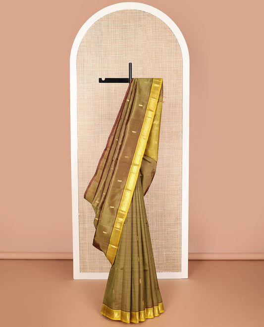 Brown floral buttas kancheepuram silk saree with contrast border of zari design border & floral design pallu