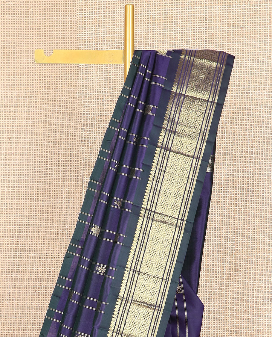 Blue thazampoo rekku buttas Kanchipuram silk saree, contrast one-sided border of thilakam mokku,muthu,banaras & jaal & zari design pallu