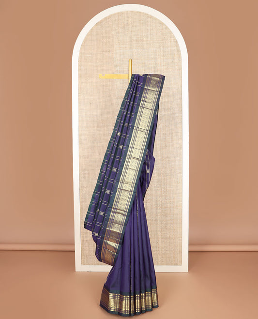 Blue thazampoo rekku buttas Kanchipuram silk saree, contrast one-sided border of thilakam mokku,muthu,banaras & jaal & zari design pallu