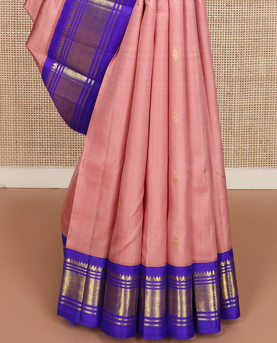 Onion pink zari buttas Kanchipuram silk saree, contrast one-sided korvai border of thilakam mokku, banaras, and jaal design, and zari design pallu