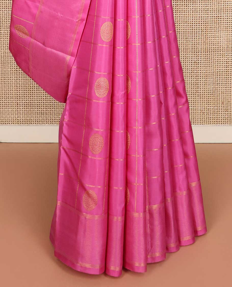 Pink annam chakram buttas enclosed checked Kanchipuram silk saree, zari border of stripes, and pallu of scallop designs