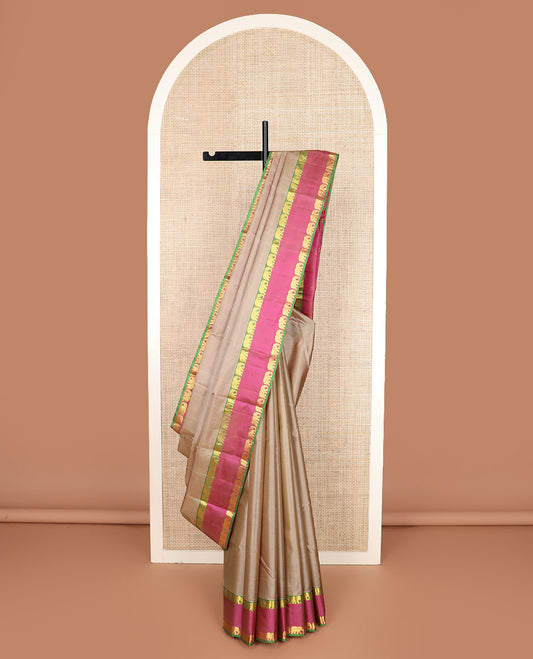 Sandal striped Kanchipuram silk saree, contrast mayil yaanai rettai pettu zari border, and zari striped pallu