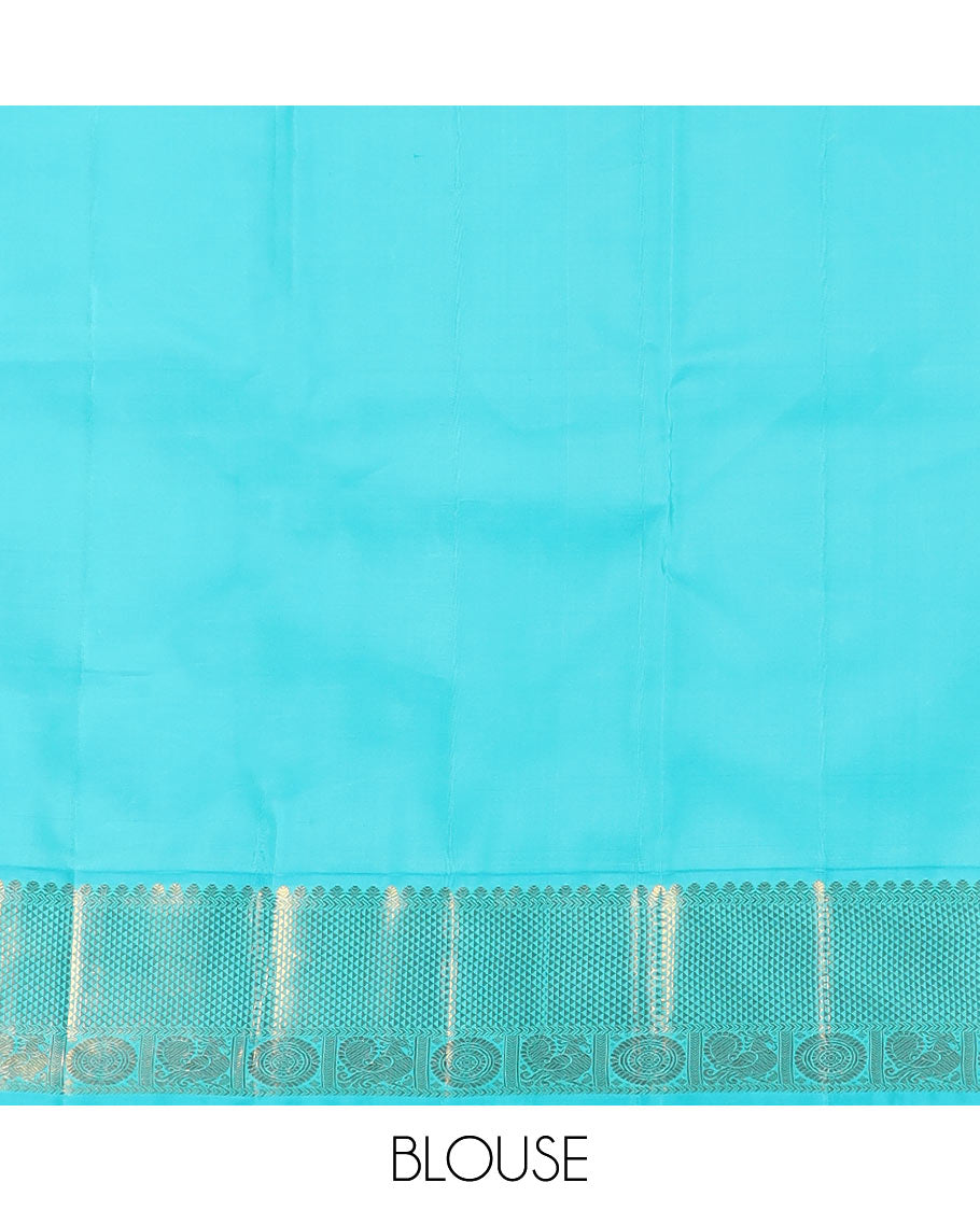 Red vanki manga buttas Kanchipuram silk saree, contrast korvai border of salngai, banaras, ara maadam, and anna chakram designs, and jaal pallu
