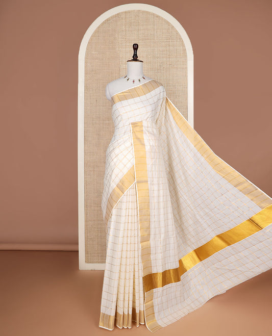 Gold checked design Kerala saree, zari border, and zari pallu