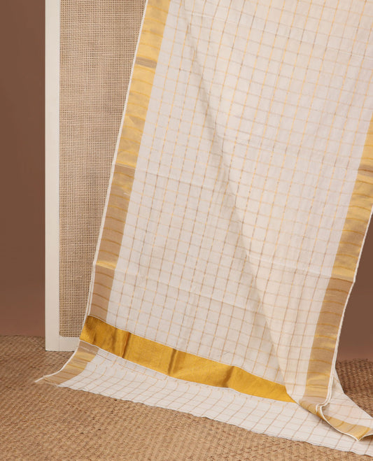 Gold checked design Kerala saree, zari border, and zari pallu