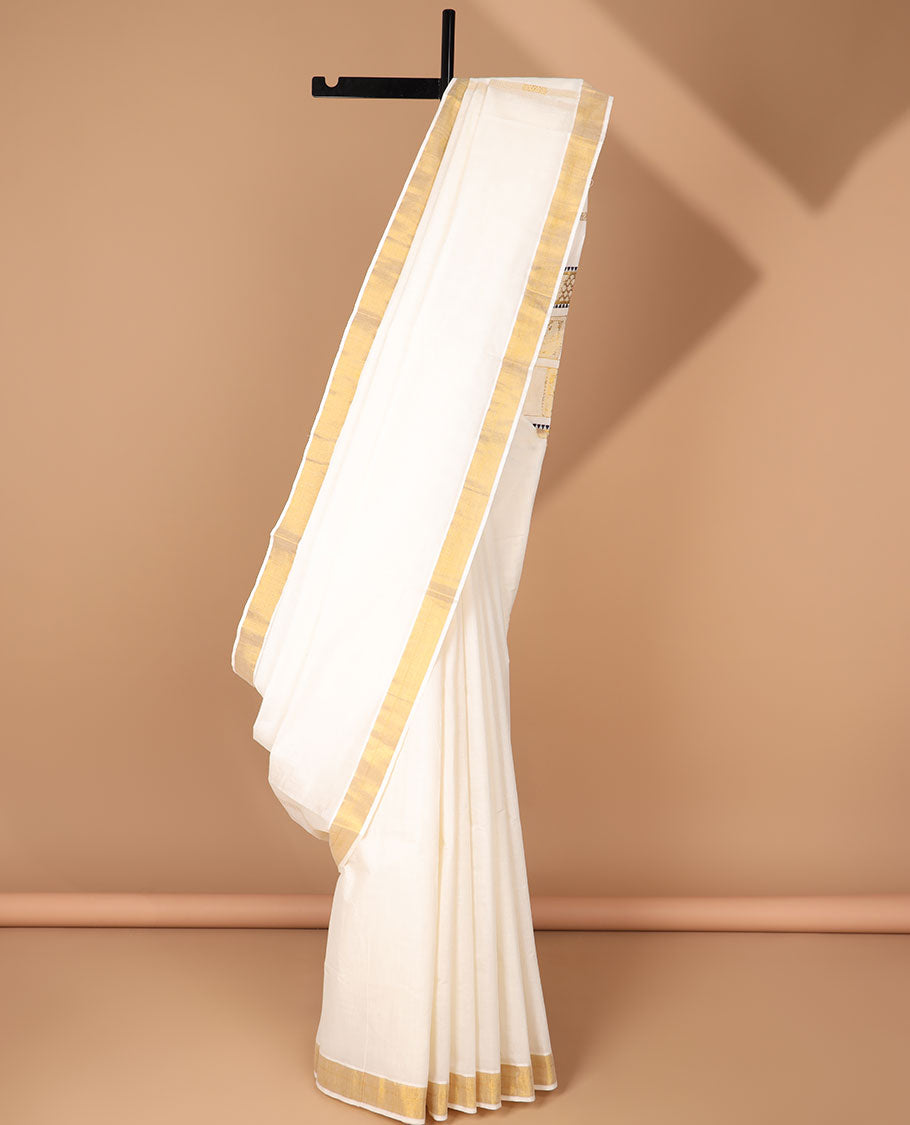 Cream kerala saree with zari designs, zari border & pallu of peacock & butterfly designs