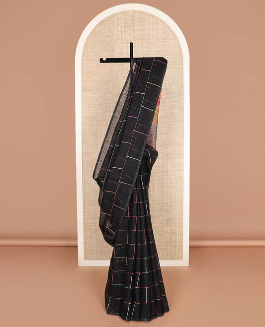 Borderless black checked linen cotton saree, contrast pallu of colorful floral motifs