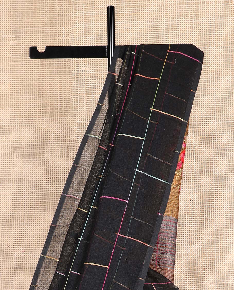 Borderless black checked linen cotton saree, contrast pallu of colorful floral motifs