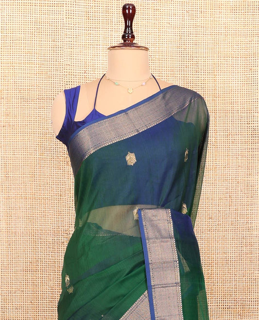 Green Maheswari Cotton Saree, Bedecked with Zari Buttas All Over Its Body, Complemented by Contrast Border of Traditional Zari Designs, Zari Decked Up Pallu and Paired with a Matching Blouse