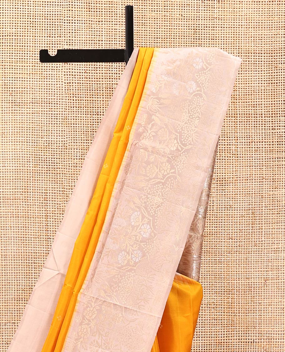 Yellow Mayuri Soft Silk Saree, Subtly Woven with Buttas All Over Its Body, Complemented by Contrast Artfully Woven Border, Pallu of Floral Designs, and Paired with a Contrast Blouse