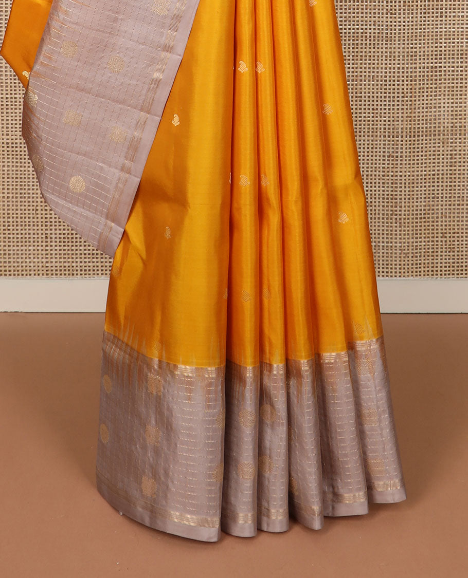 Yellow zari buttas soft silk saree, contrast checked border of annam chakram motifs & zari-rich jaal pallu