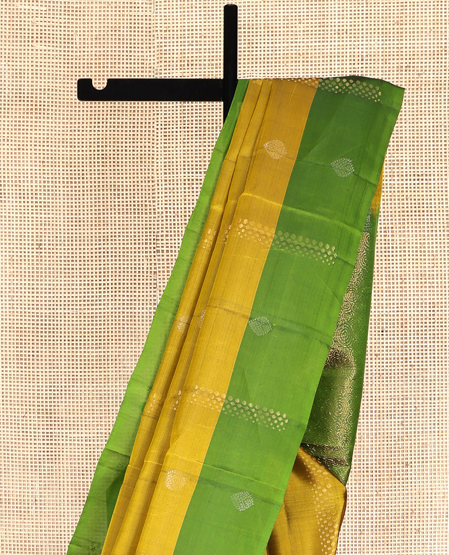 Yellow Mayuri Lite Silk Mix Saree, Woven with Zari Buttas All Over Its Body, Complemented by a Contrast Buttas Border, Pallu of Spiral Designs, and Paired with a Contrast Blouse