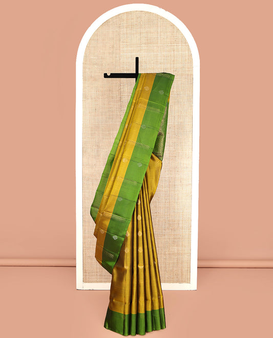 Yellow Mayuri Lite Silk Mix Saree, Woven with Zari Buttas All Over Its Body, Complemented by a Contrast Buttas Border, Pallu of Spiral Designs, and Paired with a Contrast Blouse