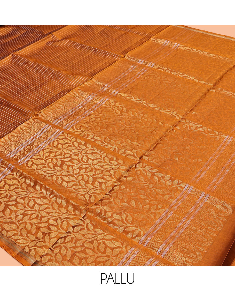 Orange Mayuri Lite Silk Mix Saree, Adorned with Zari Stripes and Floral Buttas, a Zari Piping Border, Pallu of Leaf Vine and a Matching Blouse