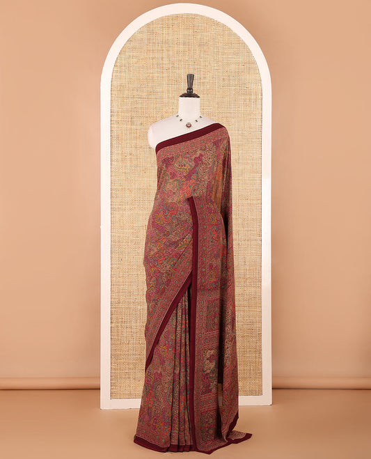Chikku intricate paisley printed kimaya saree, floral printed border, paisley printed pallu & contrast printed blouse