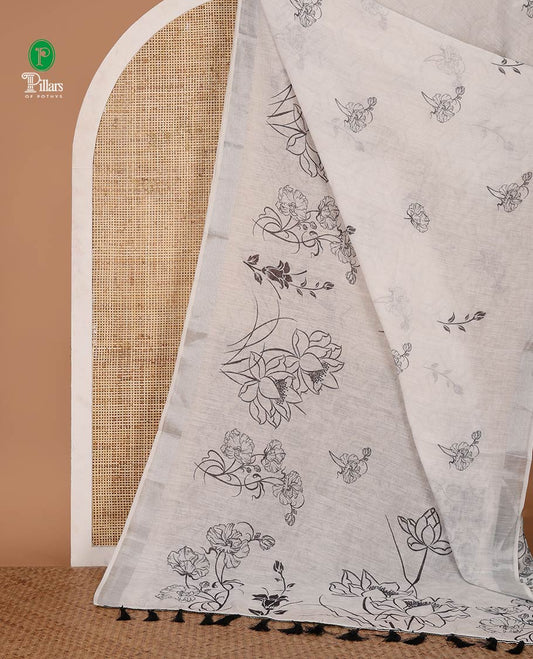 White unique-shaped floral printed linen cotton saree, silver zari border, floral printed pallu & intricate floral print blouse