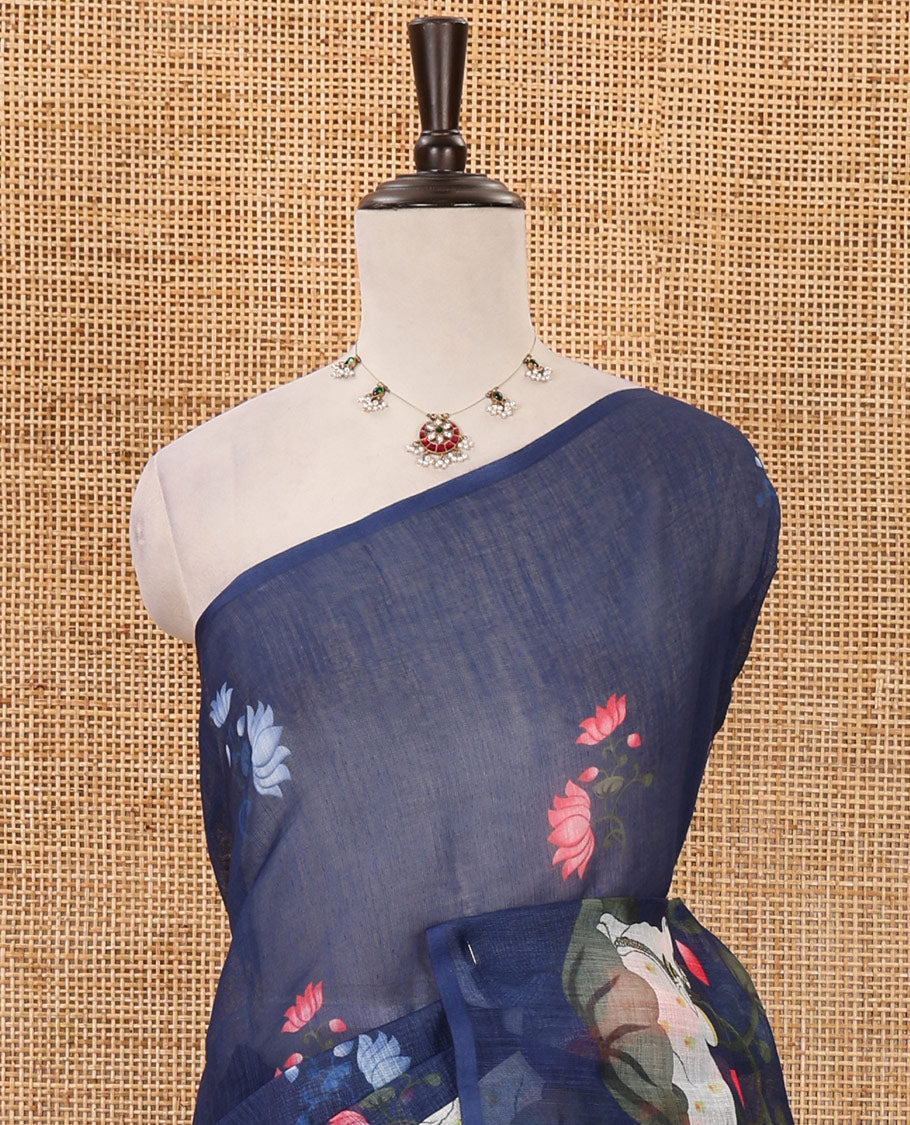 Borderless navy blue Pichwai cow & lotus motifs printed linen saree, pallu of Pichwai cow & lotus print & matching lotus print blouse