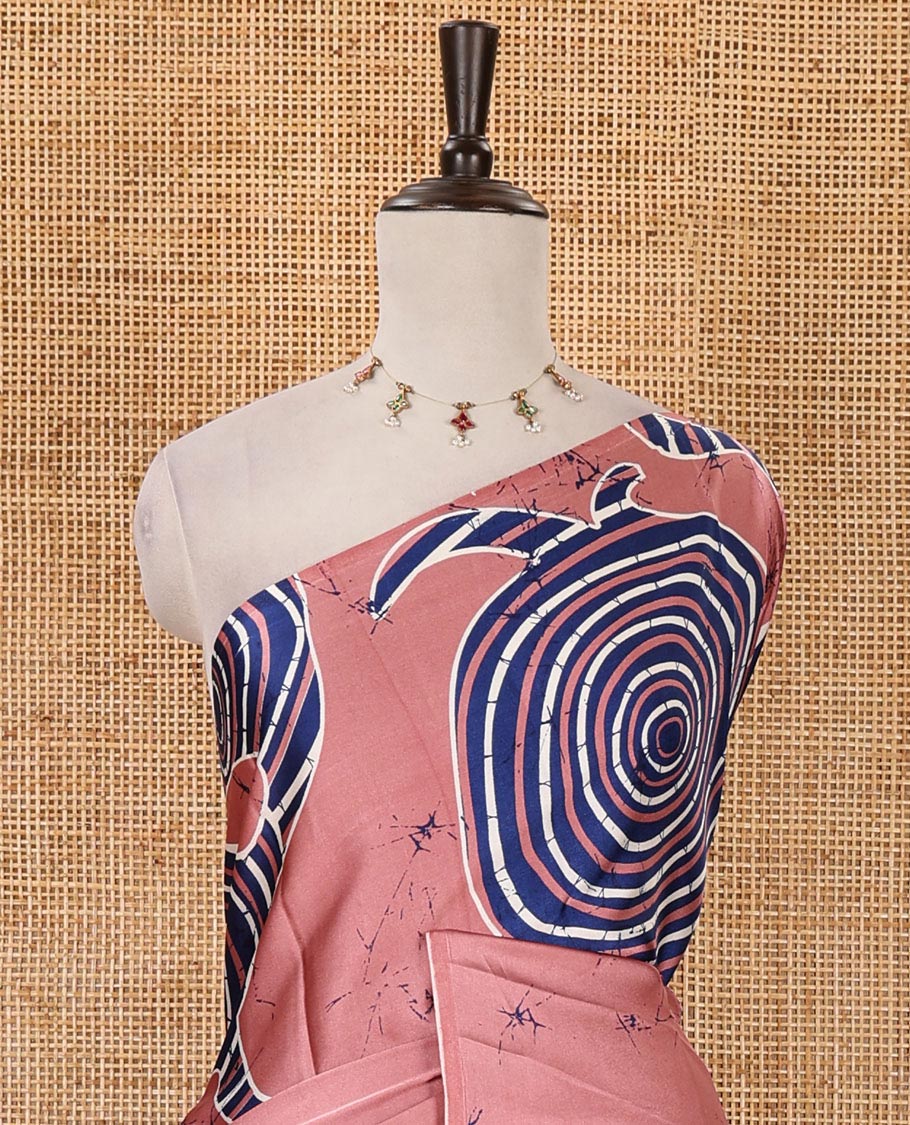 Borderless onion pink batik-style spiral printed satin crepe saree, printed pallu & matching printed blouse