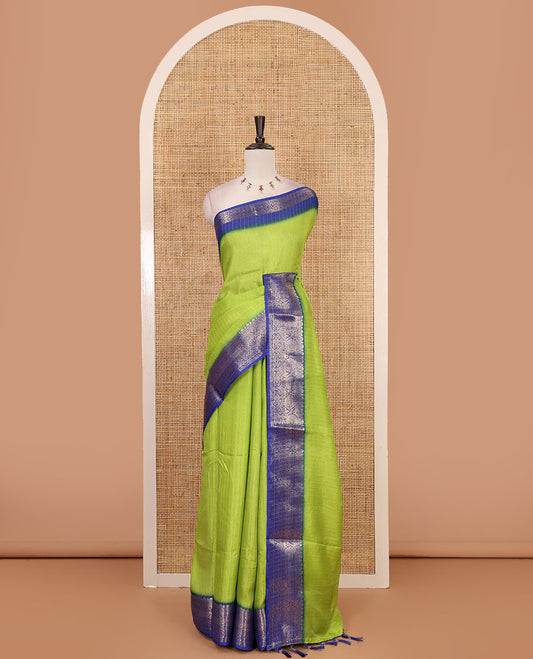 Parrot green gold zari vertical striped dola silk saree, contrast traditional zari border of manga design, striped pallu & contrast diamond design blouse