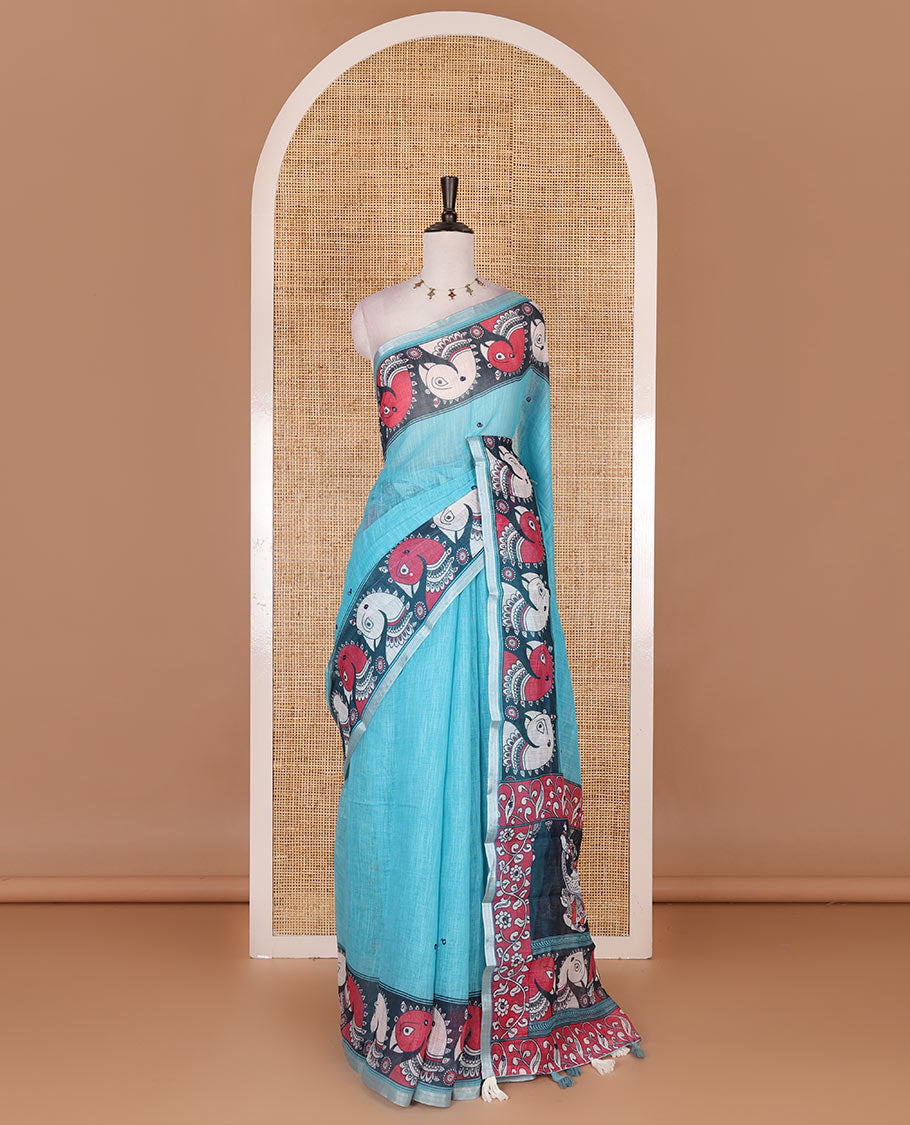 Blue mirror thread embroidered linen saree, contrast kalamkari peacock printed border, pallu of kalamkari peacock and human figurines print, and printed blouse