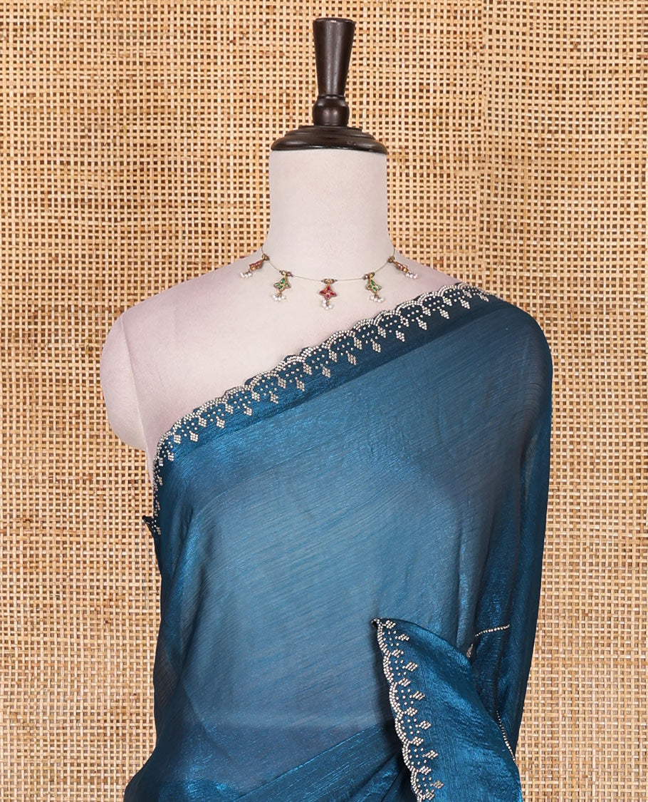 Rama blue micro stonework Fendi chiffon saree, scallop micro stonework border, stonework paisley pallu, and matching micro stone work blouse