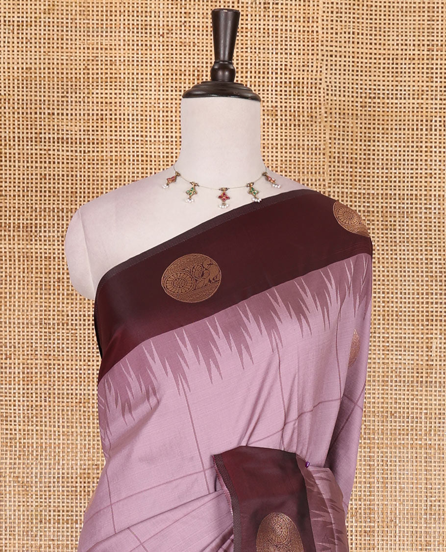 Pink round peacock chakram buttas enclosed checked Mulberry silk saree, contrast round peacock chakra border, zari worven pallu, and contrast zari blouse
