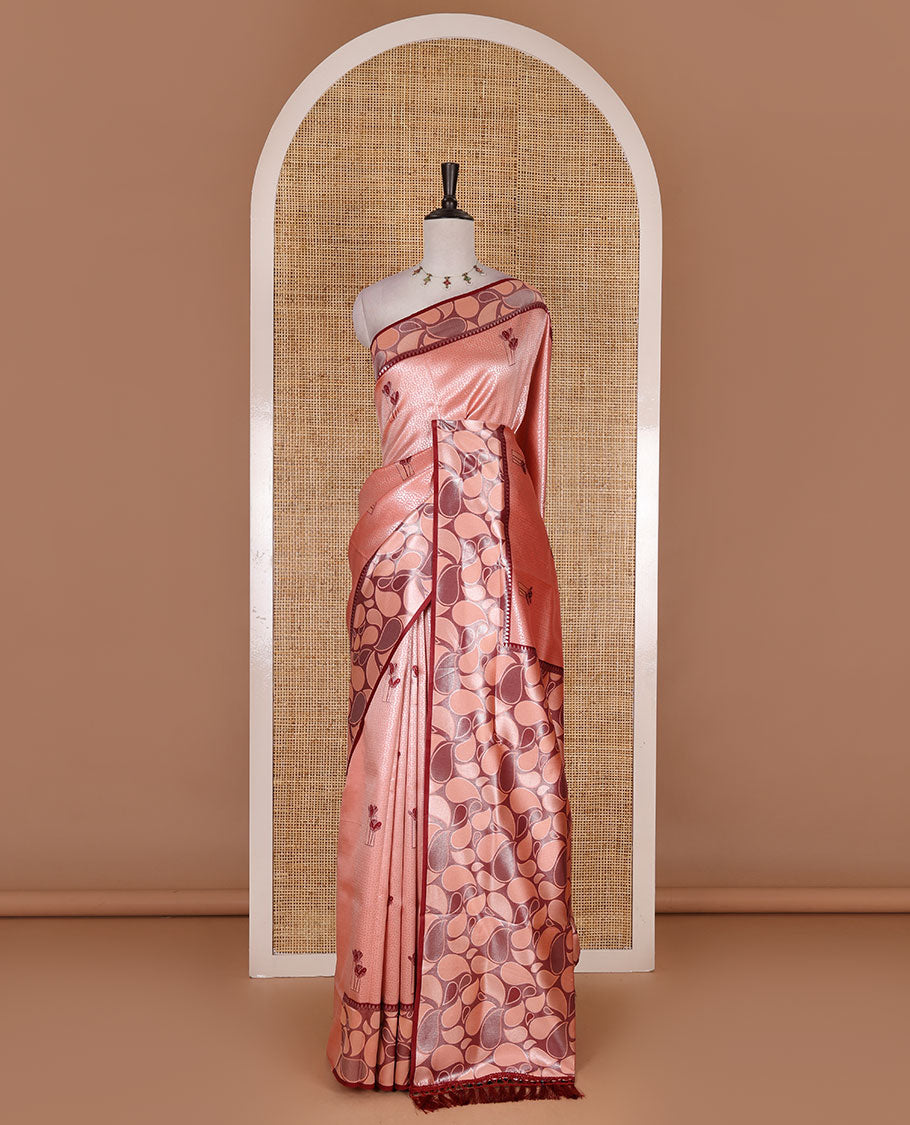 Peach jacquard kanchi silk saree, contrast border, and pallu steeped with paisley motifs with contrast zari design blouse