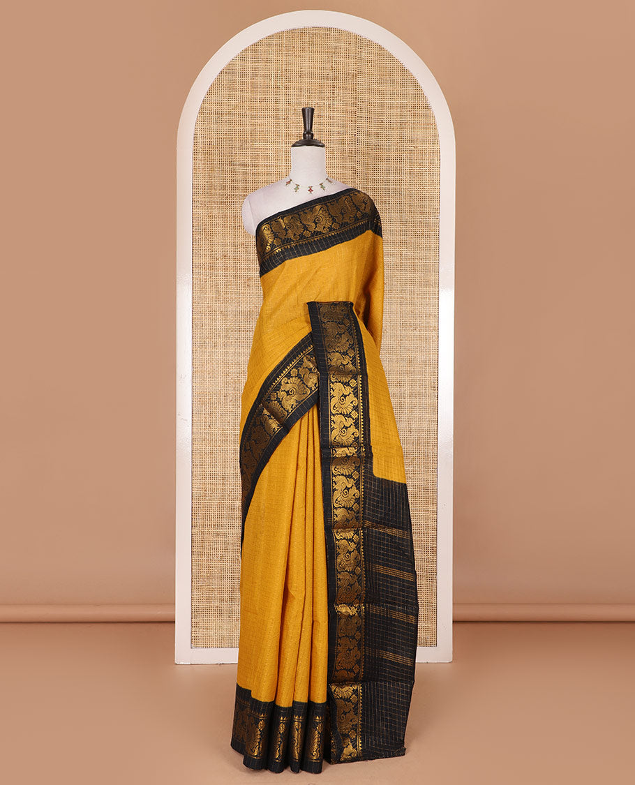Mustard zari checked Sungudi cotton saree, contrast peacock motif border, zari striped pallu, and contrast zari design blouse