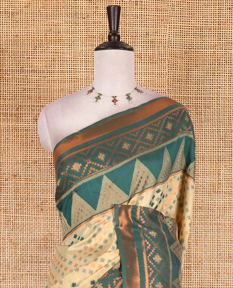 Chikku ikkat style zari and thread buttas semi-tussar saree, contrast ikkat design border, geometric patterned pallu, and a contrast blouse