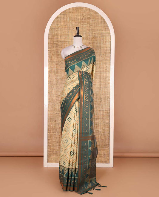 Chikku ikkat style zari and thread buttas semi-tussar saree, contrast ikkat design border, geometric patterned pallu, and a contrast blouse