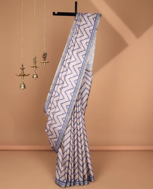 Crean zig zag digital printed semi tussar saree with arrow design border & kicha design pallu along with contrast lining blouse