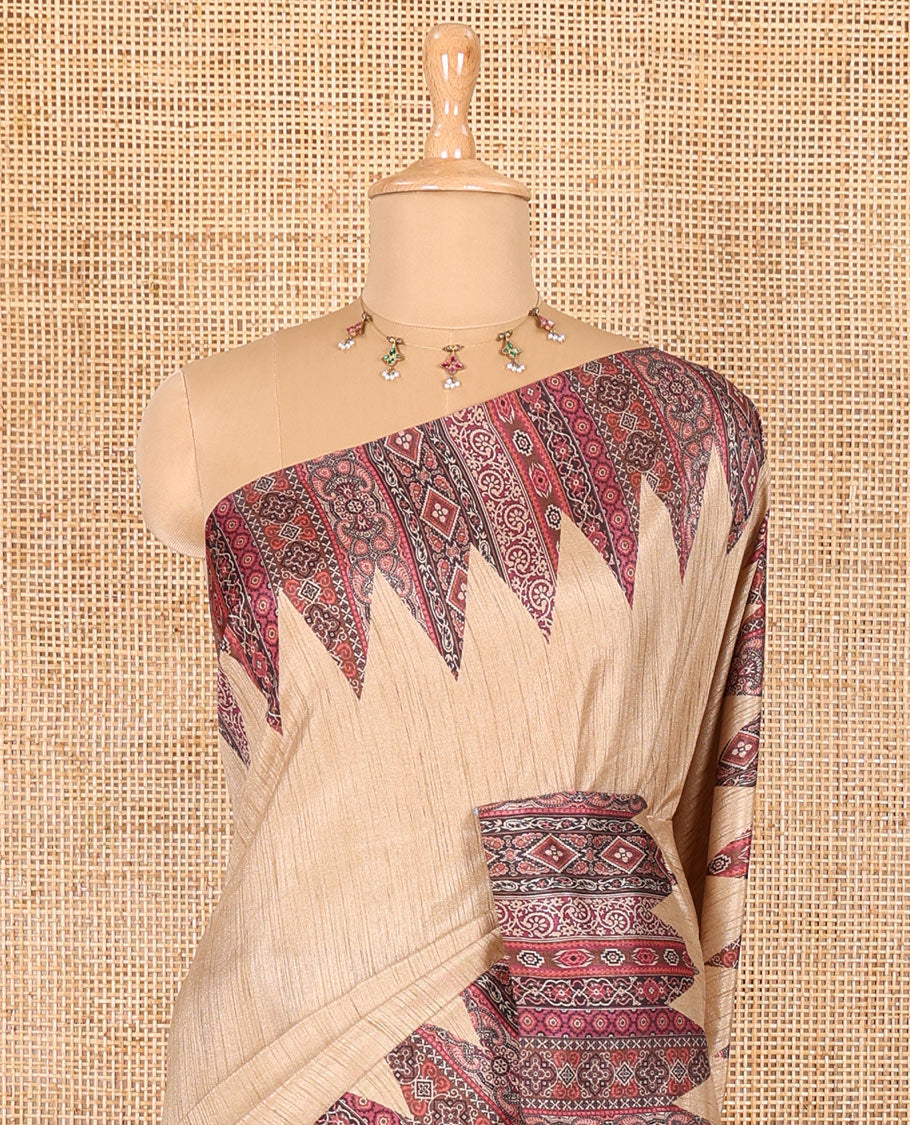 Chikku and purple plain Khicha Tussar saree, temple border of intricate Ajrakh print, Ajrakh printed pallu, and contrast Ajrakh printed blouse