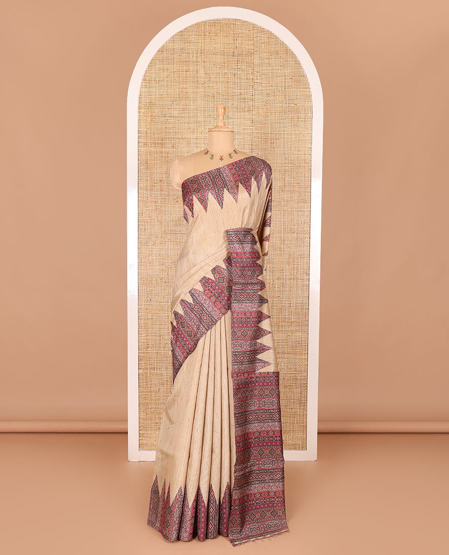 Chikku and purple plain Khicha Tussar saree, temple border of intricate Ajrakh print, Ajrakh printed pallu, and contrast Ajrakh printed blouse