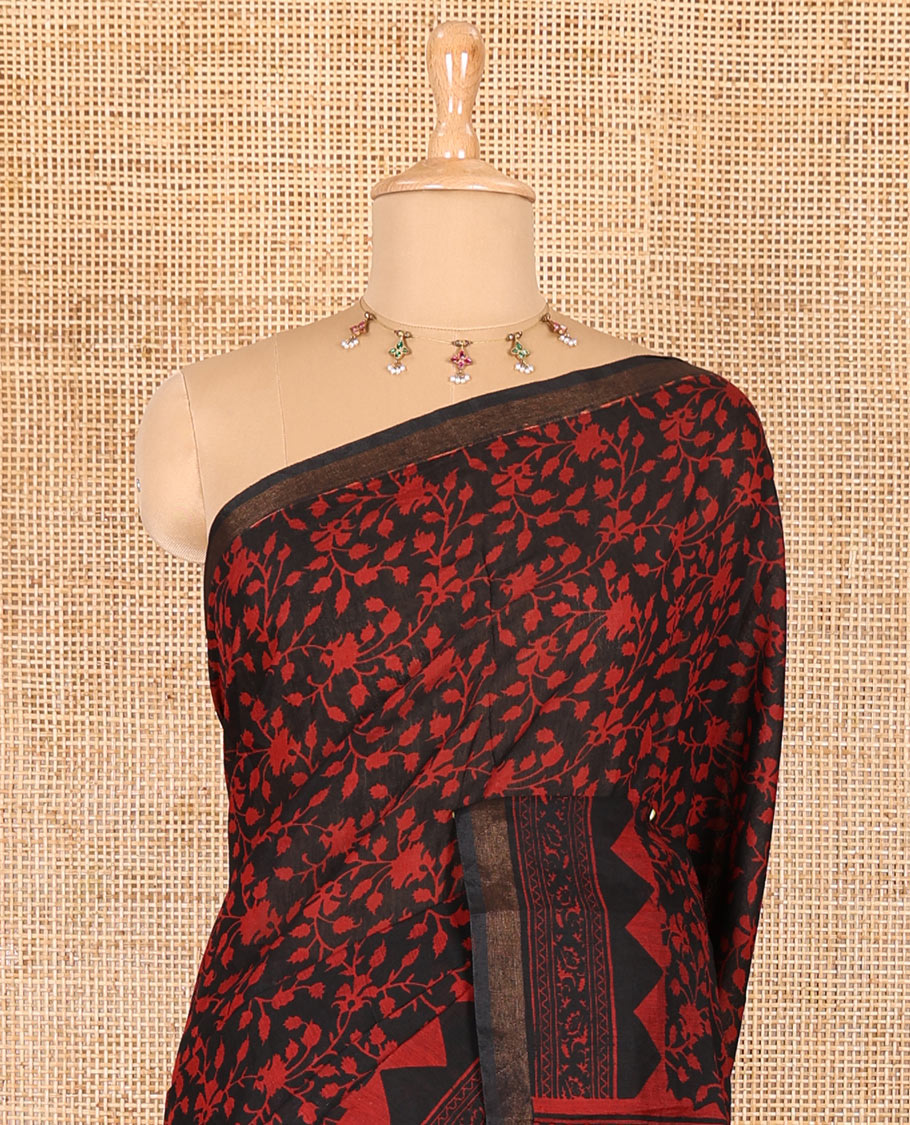 Black floral vine hand block printed Chanderi cotton saree with temple border of print, and piping zari work, printed pallu, and a zig-zag striped blouse