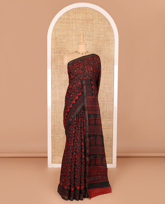 Black floral vine hand block printed Chanderi cotton saree with temple border of print, and piping zari work, printed pallu, and a zig-zag striped blouse