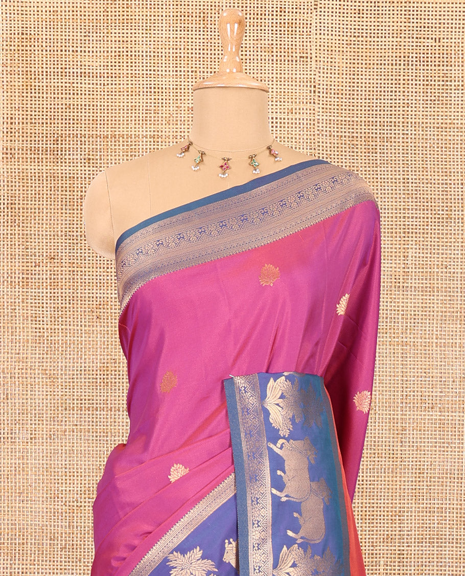 Magenta zari buttas elite soft silk saree, contrast traditional zari border of Pichwai cow design, scallop pallu, and a contrast zari design blouse