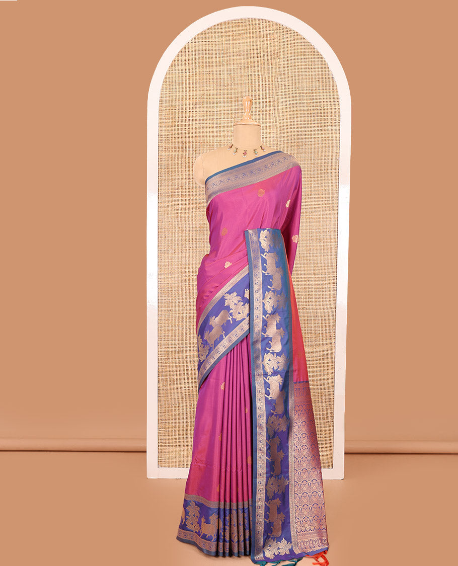 Magenta zari buttas elite soft silk saree, contrast traditional zari border of Pichwai cow design, scallop pallu, and a contrast zari design blouse