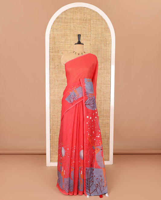 Borderless tomato pink Christmas-theme Snow-fall, moon, Christmas trees, and deer motifs printed linen cotton saree with a contrast printed blouse