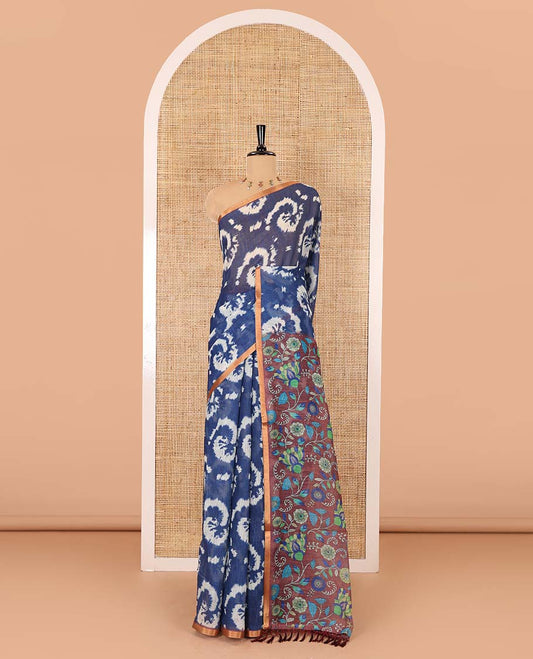 Borderless navy blue shibori printed linen cotton saree, contrast kaleidoscope colored kalamkari floral vine print, and a contrast printed blouse
