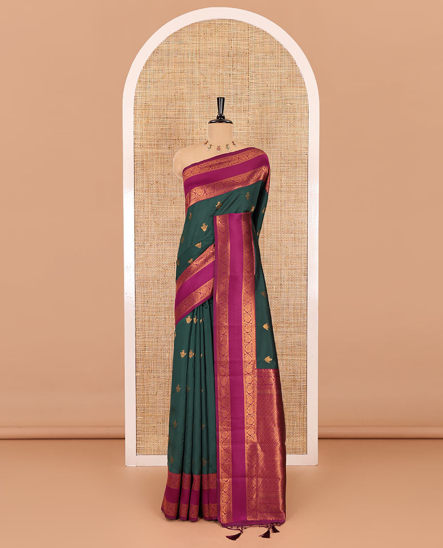 Green copper zari buttas elite soft silk saree , contrast zari weaving border , contrast brocade rich pallu with tussels , and  contrast brocade blouse
