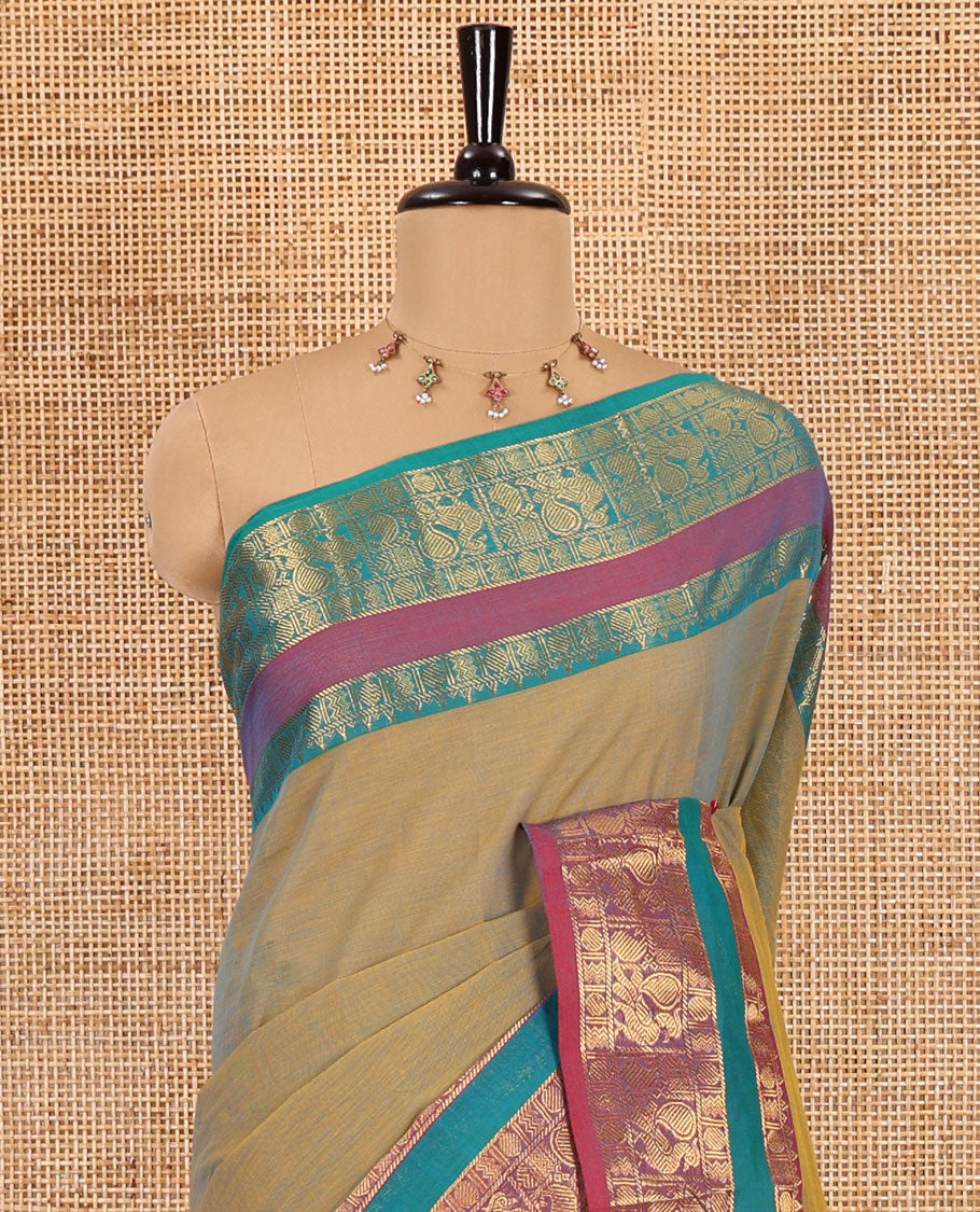 Sea green plain chettinad cotton saree , peacock, mango rudraksham zari border , lining pallu with tussels