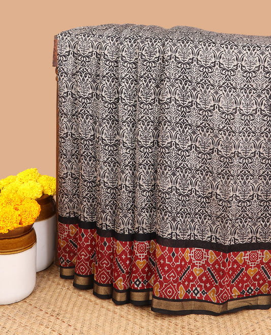 Black with maroon printed design chanderi cotton saree,ikkat printed, gold zari lining border & ikkat printed pallu along with printed blouse