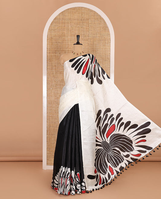 Borderless black fancy motifs batik-printed art khadi silk saree, contrast printed pallu, and a printed blouse