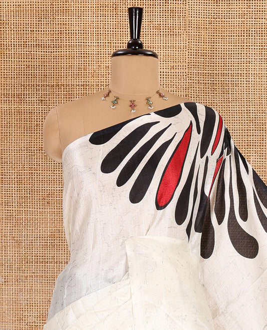 Borderless black fancy motifs batik-printed art khadi silk saree, contrast printed pallu, and a printed blouse