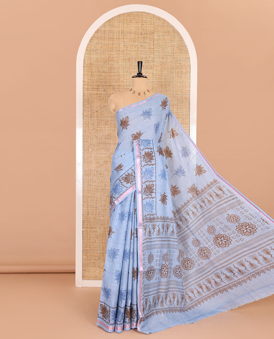 Blue lotus printed soft cotton saree, piping border, printed pallu, and a shibori printed blouse of polka dots